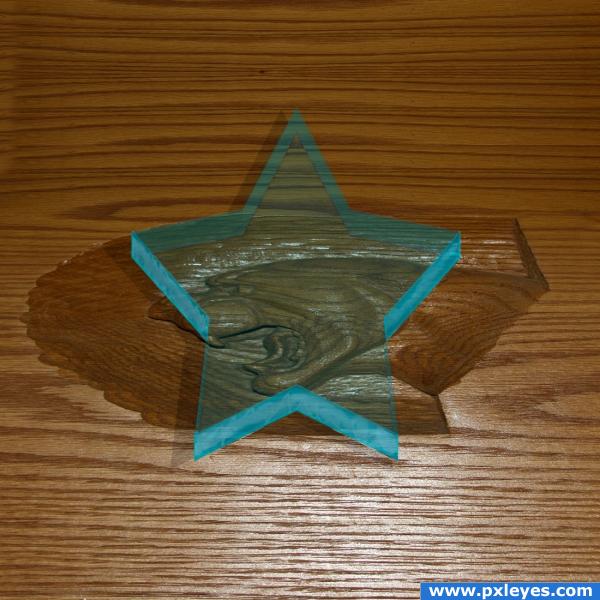 glass star on wood panther